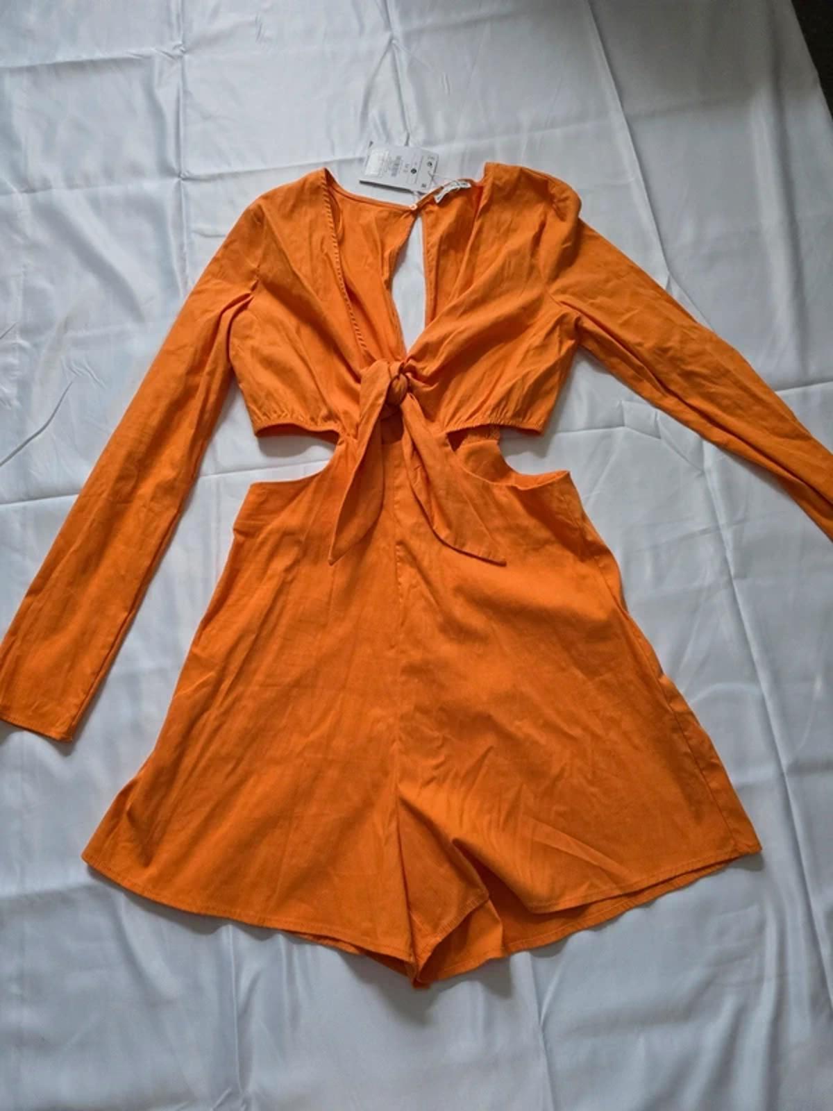 BNWT Bershka orange playsuit, cut out detail, front tie, long sleeve, size M
