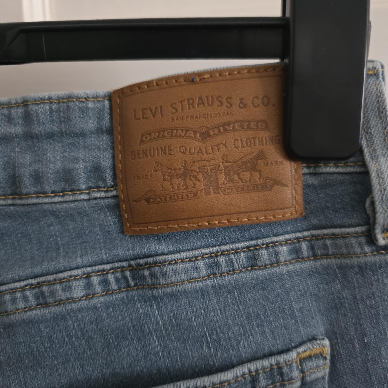 Levi's 725 High Rise Bootcut Jeans Size 31 waist (12/14), VGC, mid blue denim