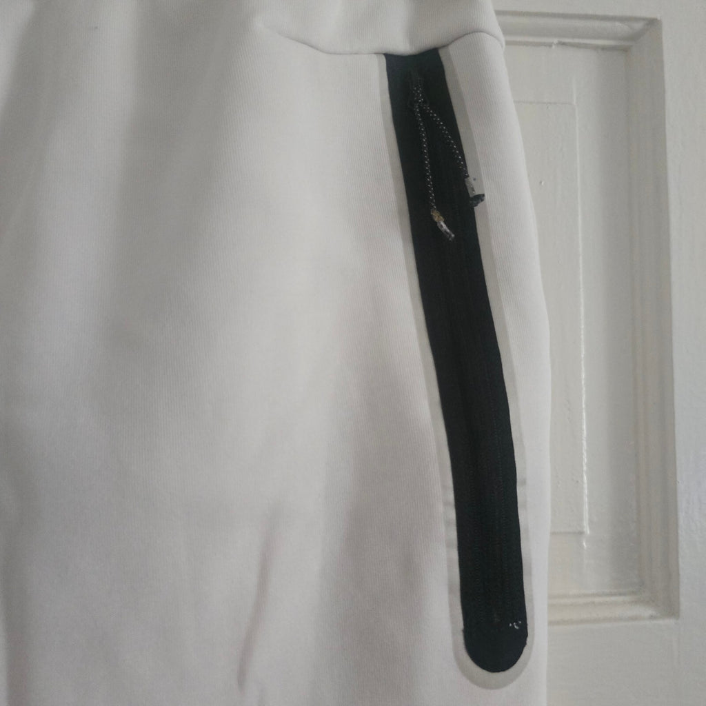 Nike White Jogger Sweatpants with Black Drawstring & Side Zipper Pocket, Size M