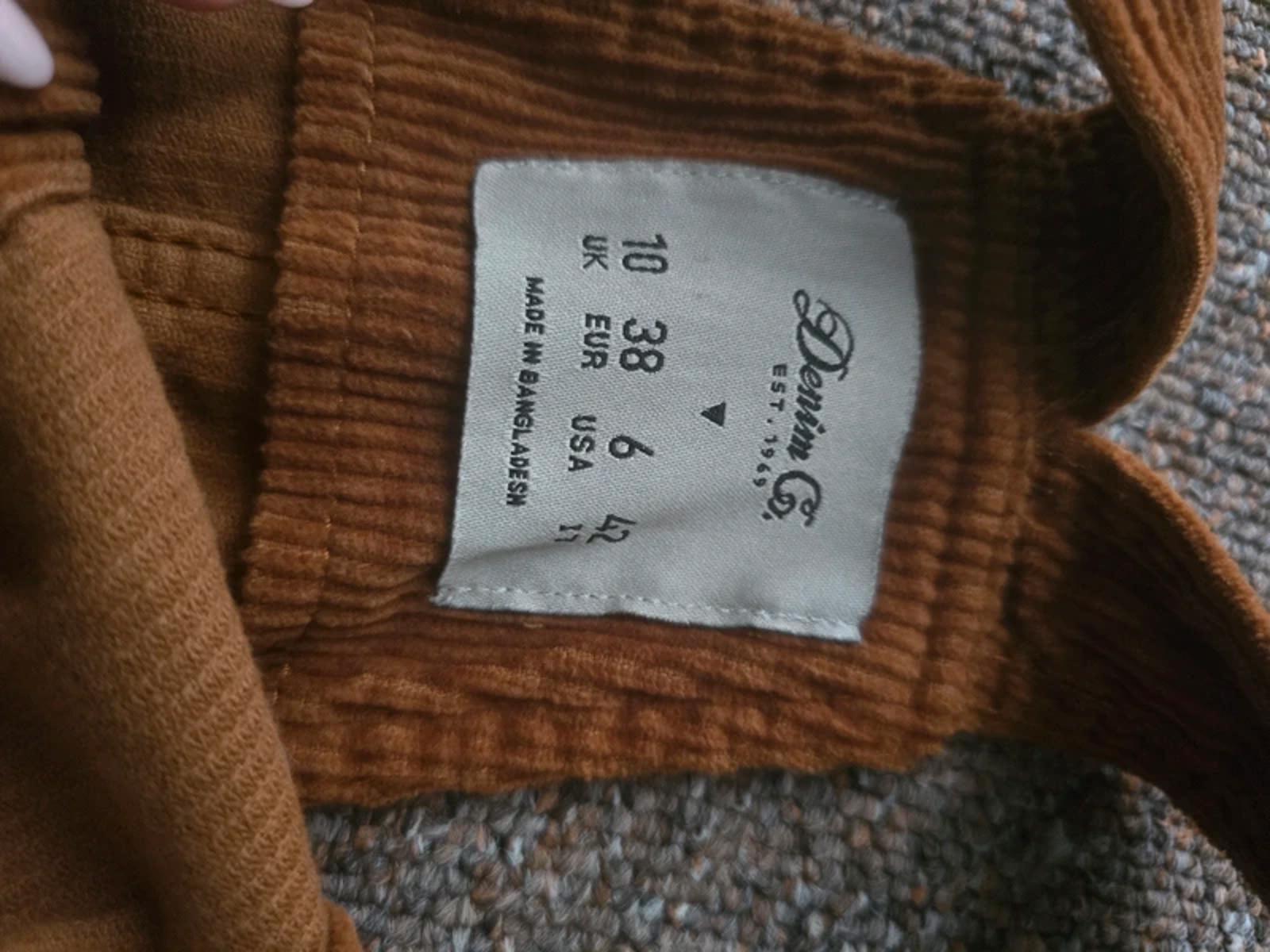 Corduroy brown/tan pinafore dress with button up front and pockets, size 10