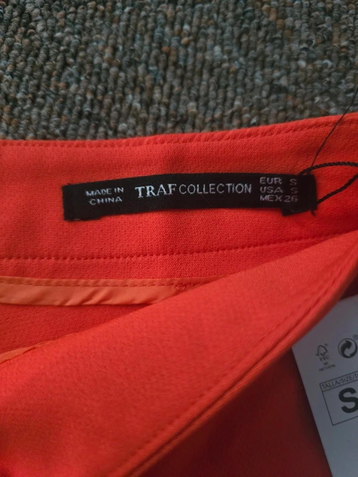 BNWT orange high waisted Ruffle frill hem shorts, size S, rrp €45 zara?