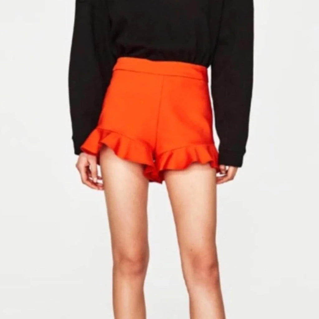 BNWT orange high waisted Ruffle frill hem shorts, size S, rrp €45 zara?