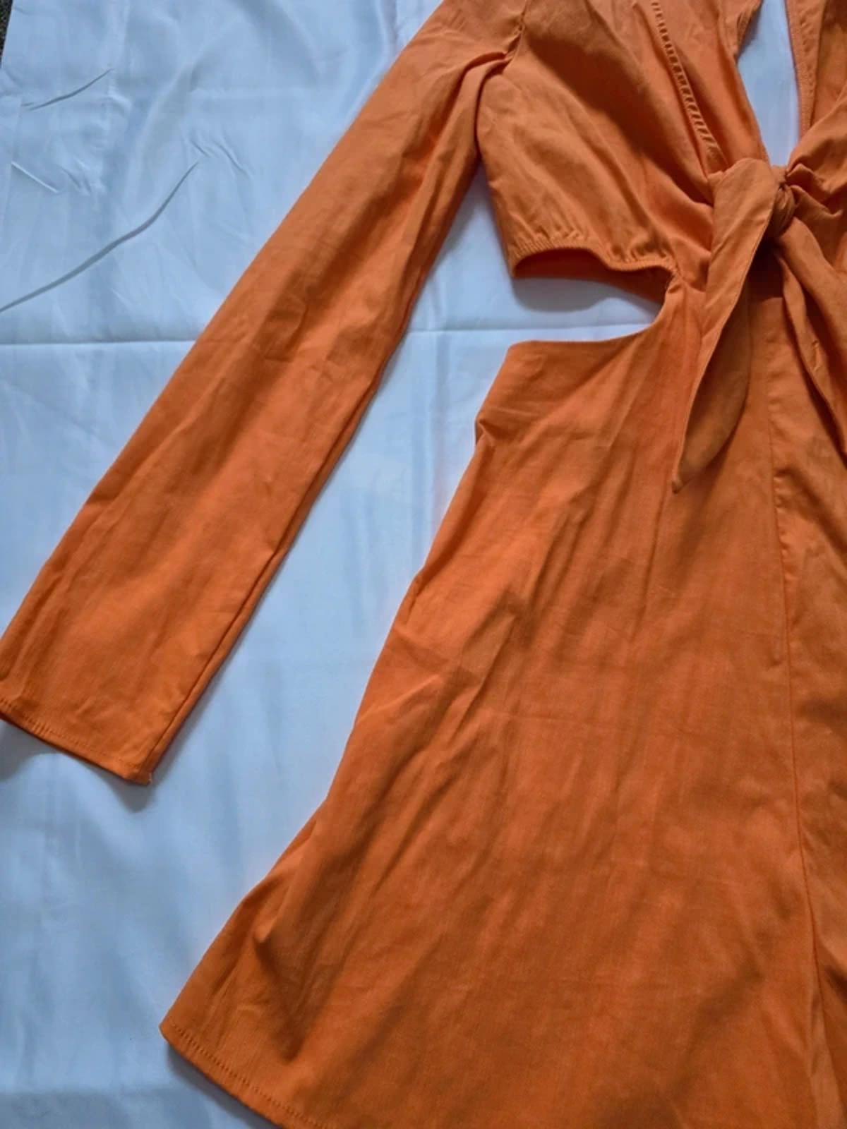 BNWT Bershka orange playsuit, cut out detail, front tie, long sleeve, size M