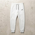 Nike White Jogger Sweatpants with Black Drawstring & Side Zipper Pocket, Size M