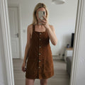 Corduroy brown/tan pinafore dress with button up front and pockets, size 10