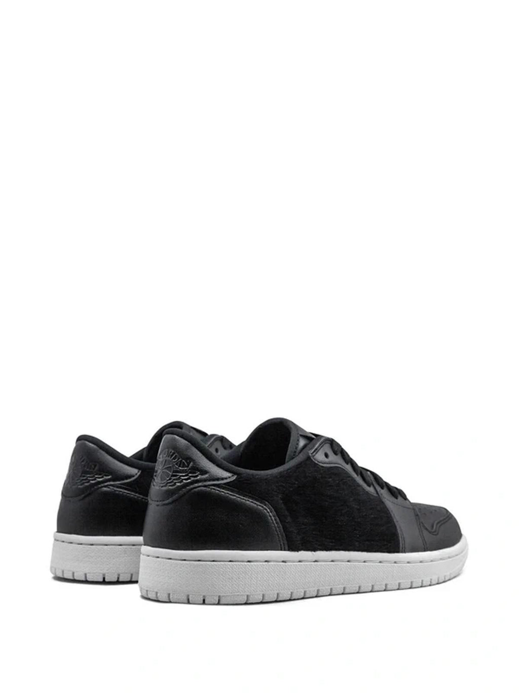 Air Jordan Unisex limited edition Retro Black leather and pony hair trainer, 7.5