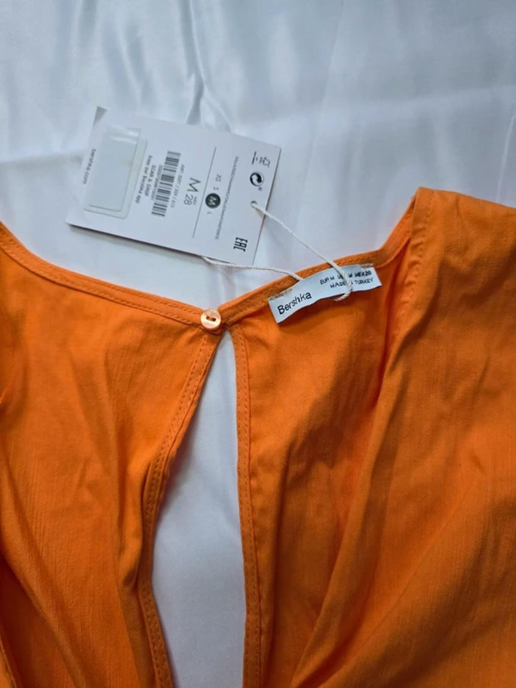 BNWT Bershka orange playsuit, cut out detail, front tie, long sleeve, size M