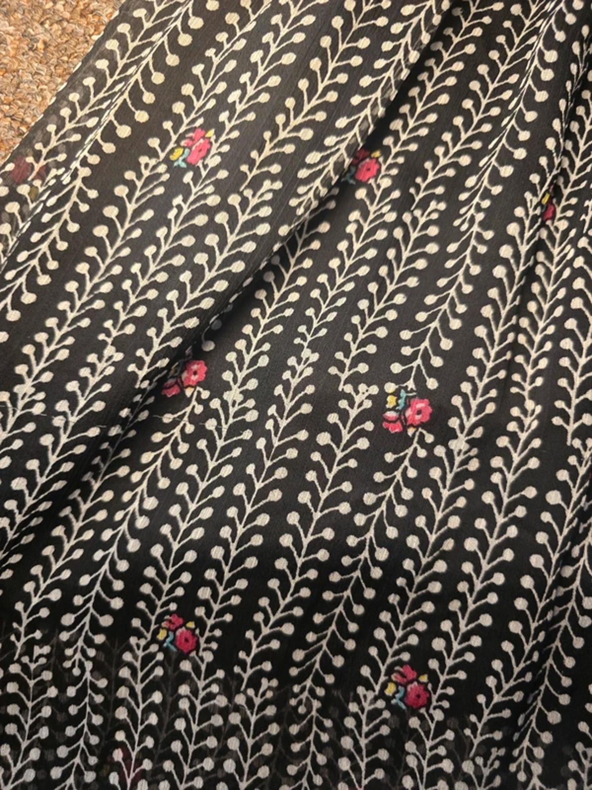 Black and white patterned dress, ruched waist, tie neck detail Ruffle hem, S